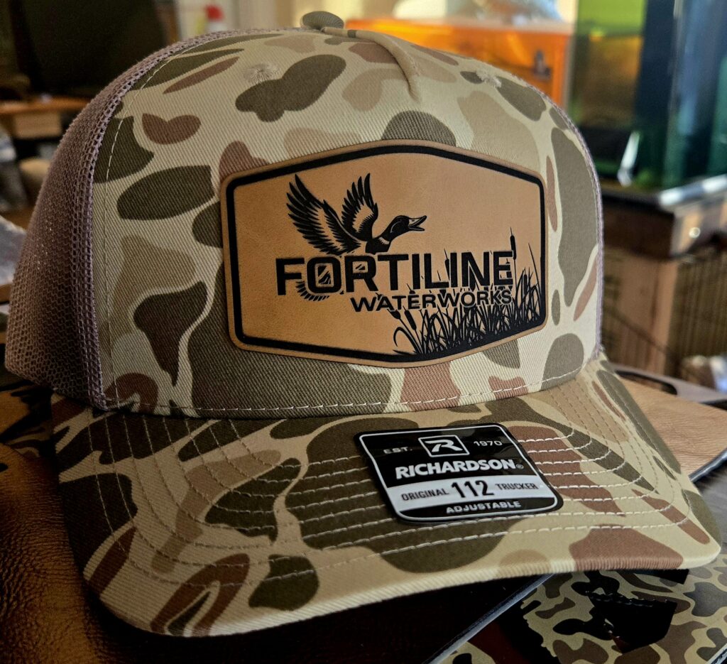 Camouflage Fortiline Waterproof cap with logo patch.
