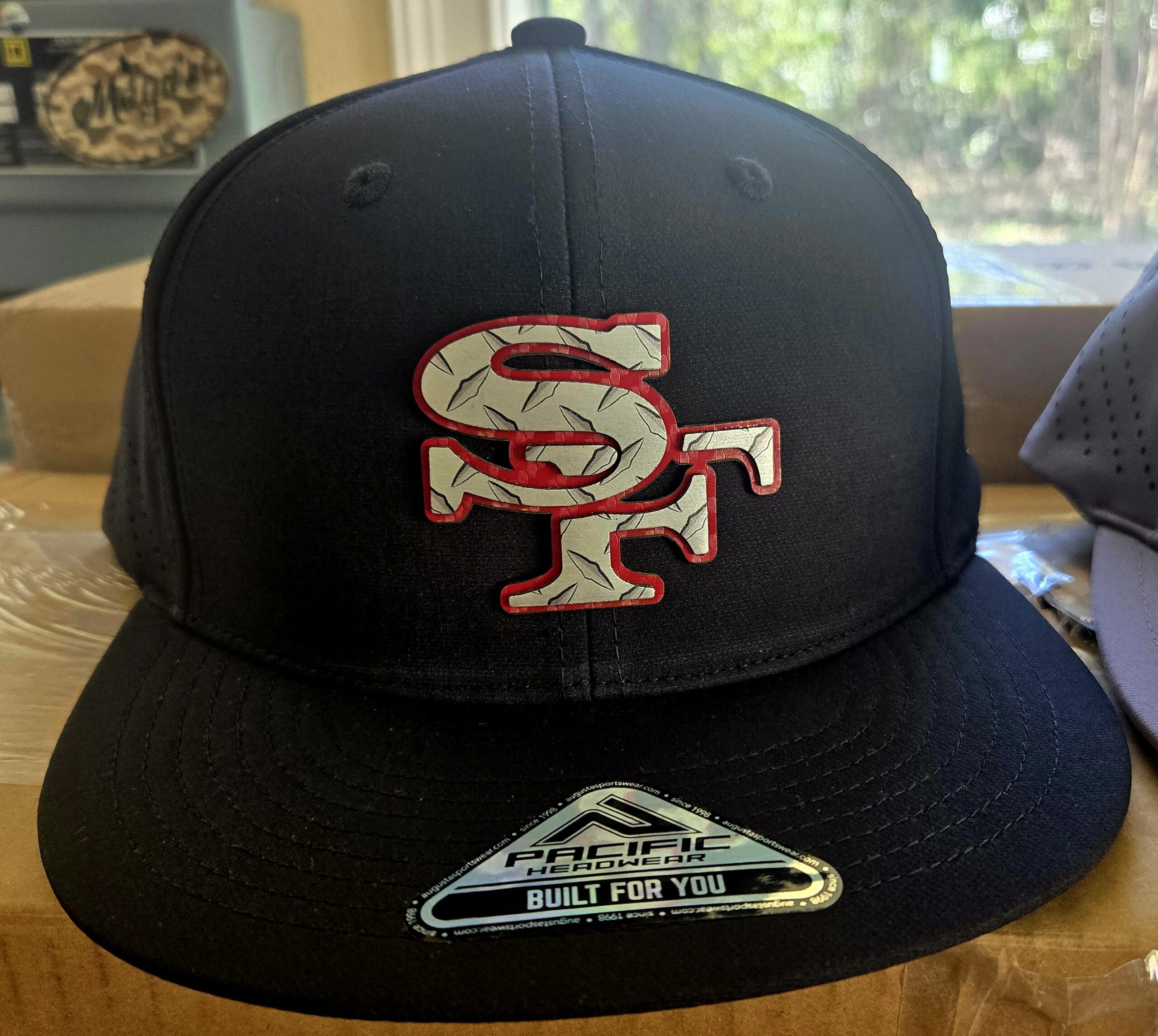 Black SF hat featuring the San Francisco 49ers logo.