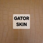 Close-up of textured material labeled 'Gator Skin'.