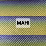 Close-up of a striped fabric with the word 'MAHI' printed on it.